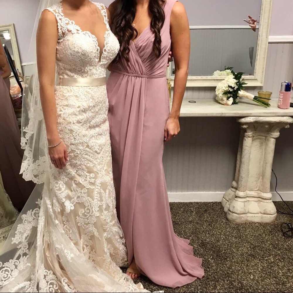 Mauve bridesmaid dress.